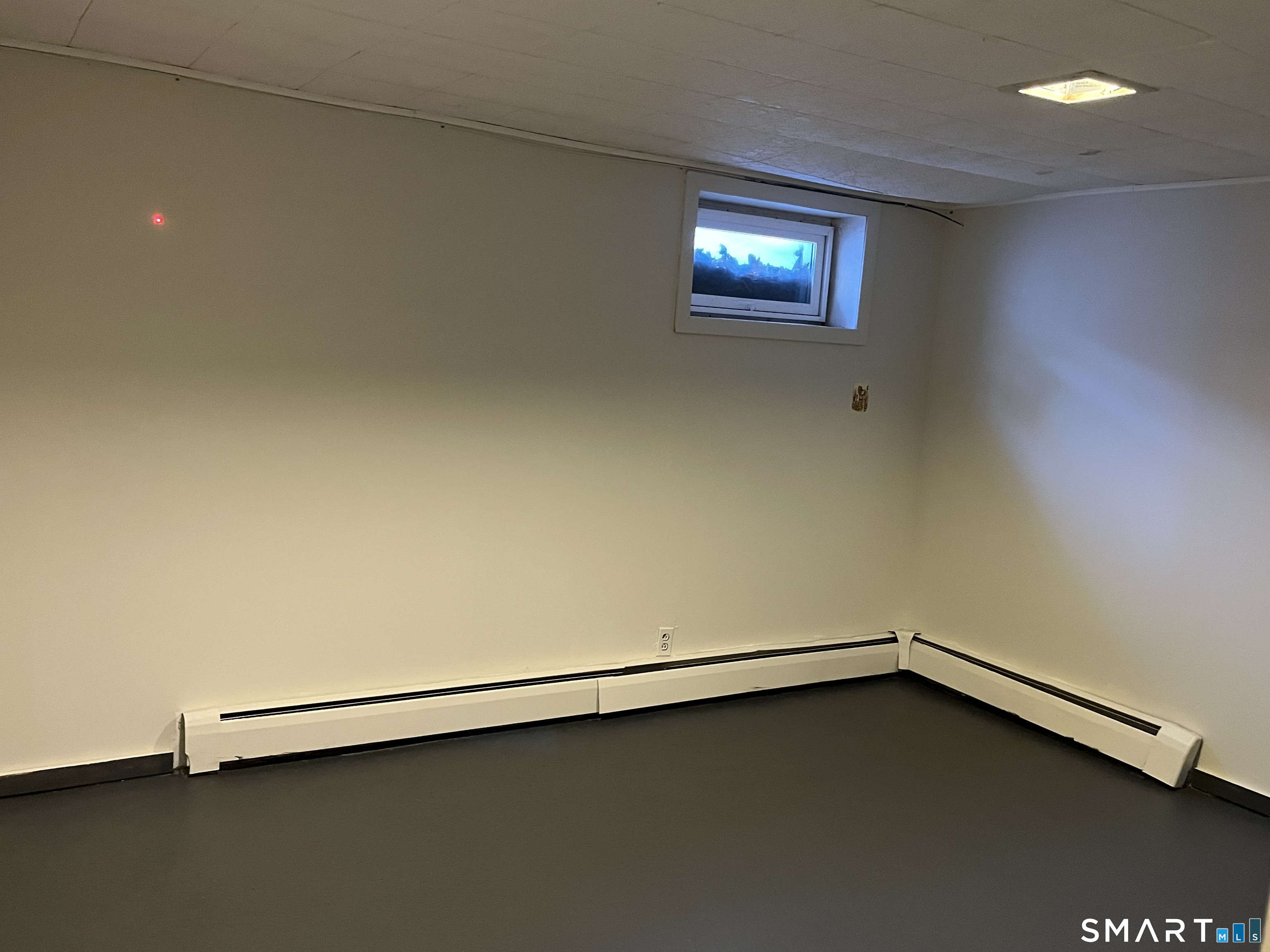 20 John Street Southington, CT 06489 - Photo 15 of 17 an empty room with a window