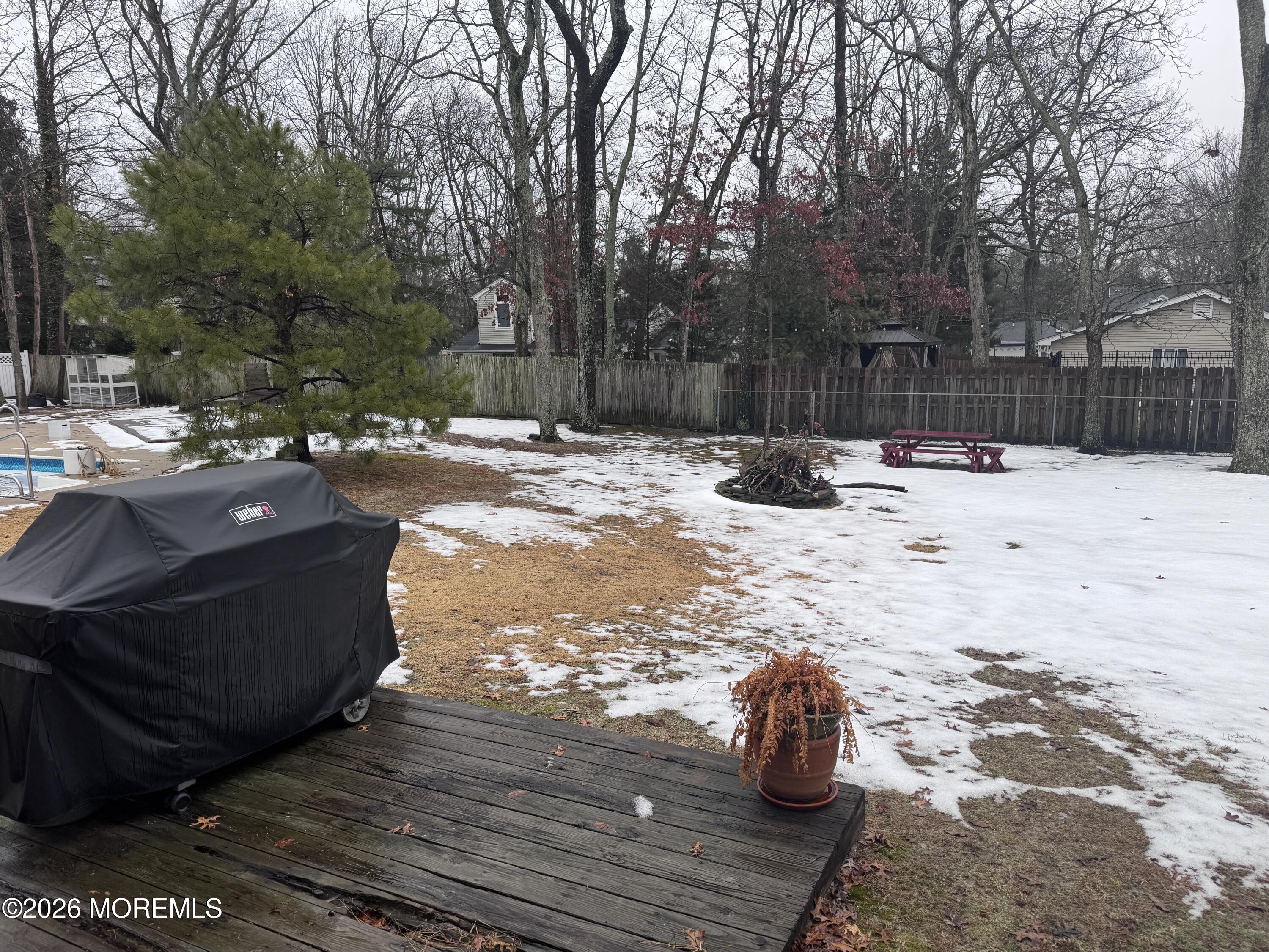 18 Liverpool Court Jackson, NJ 08527 - Photo 15 of 16 a view of outdoor space with wooden fence