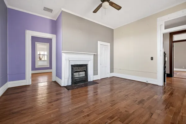 a view of livingroom with window hardwood floor and ceiling fan