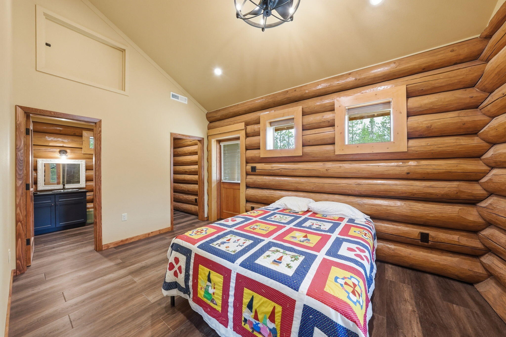 54270 Huntington Road La Pine, OR 97739 - Photo 20 of 68 a bedroom with a bed and a book shelf