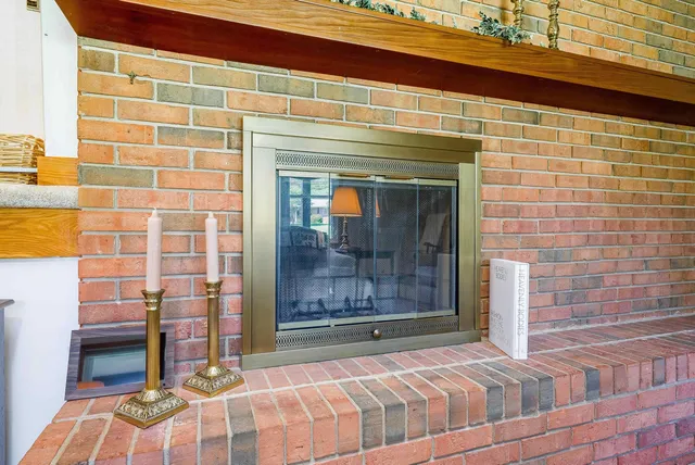 a bedroom with furniture and flat screen tv