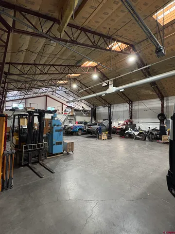 a view of empty room with wooden ceiling