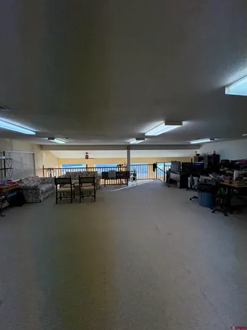 a room with lots of furniture and clutter