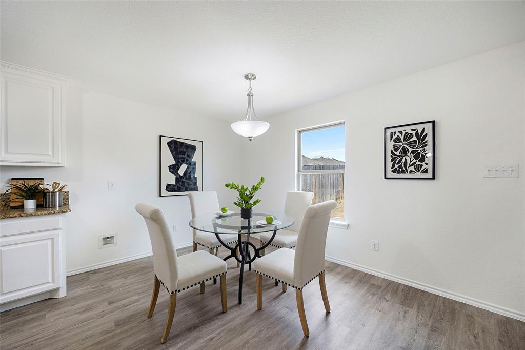 1605 Village Park Trail Burleson, TX 76028 - Photo 12 of 29 Dining space with light wood-type flooring and baseboards