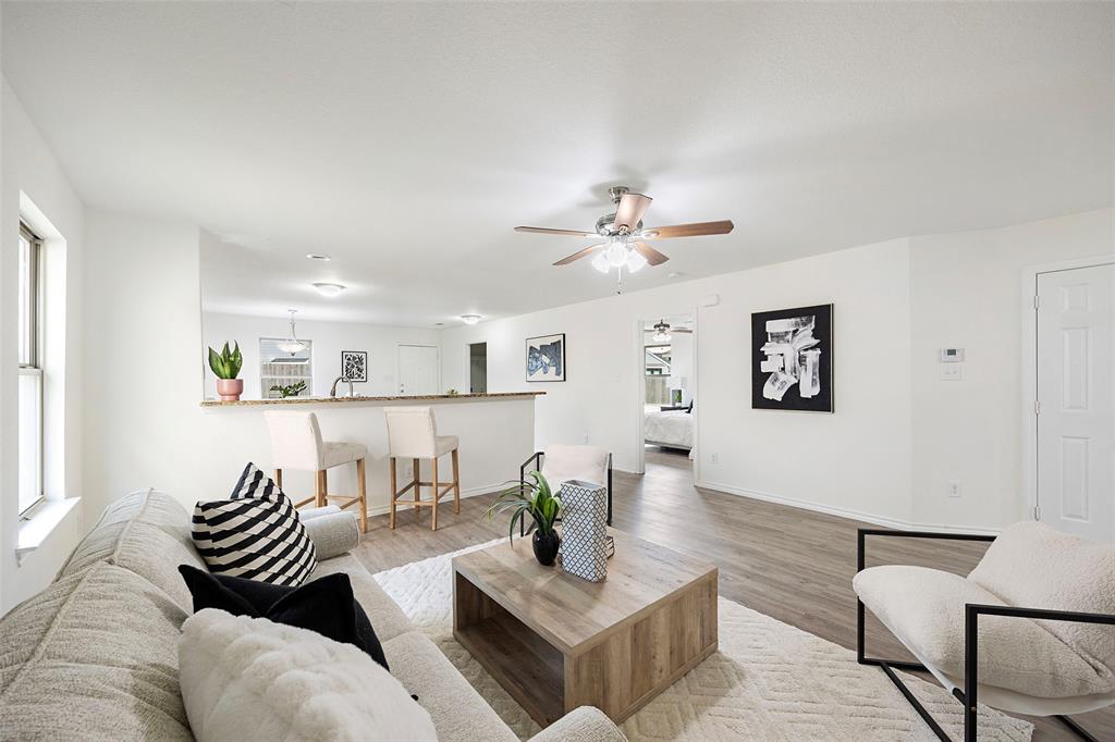 1605 Village Park Trail Burleson, TX 76028 - Photo 6 of 29 Living room with light wood-style flooring and ceiling fan