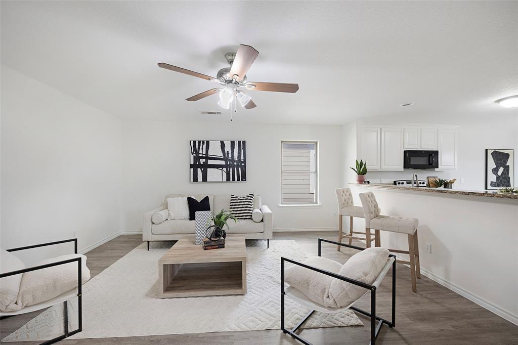 1605 Village Park Trail Burleson, TX 76028 - Photo 7 of 29 Living room featuring wood finished floors and ceiling fan
