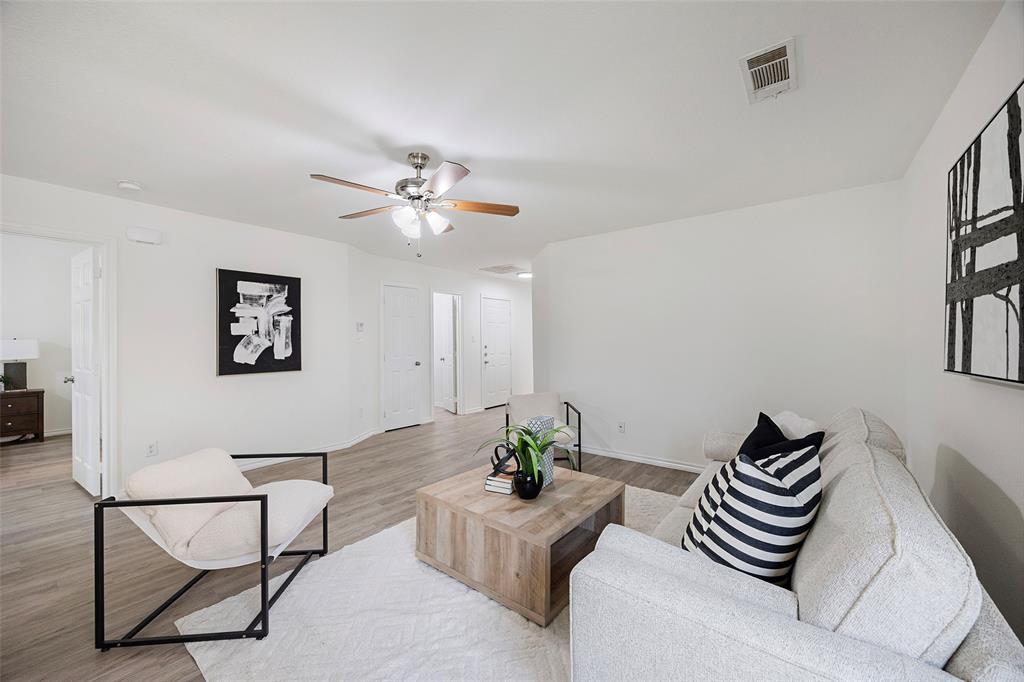1605 Village Park Trail Burleson, TX 76028 - Photo 8 of 29 Living area with wood finished floors and a ceiling fan