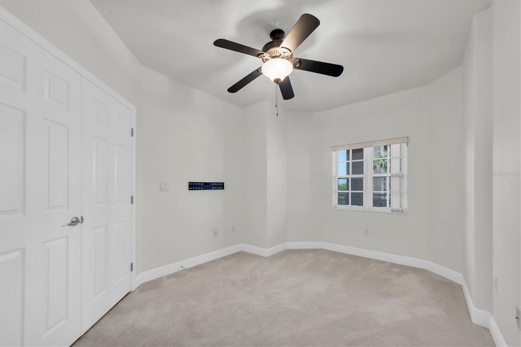 7069 Key Haven Road, Unit 302 Seminole, FL 33777 - Photo 30 of 65 a view of an empty room with a window