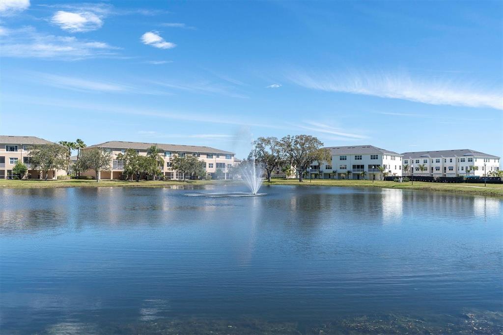 7069 Key Haven Road, Unit 302 Seminole, FL 33777 - Photo 38 of 65 a view of a lake with houses