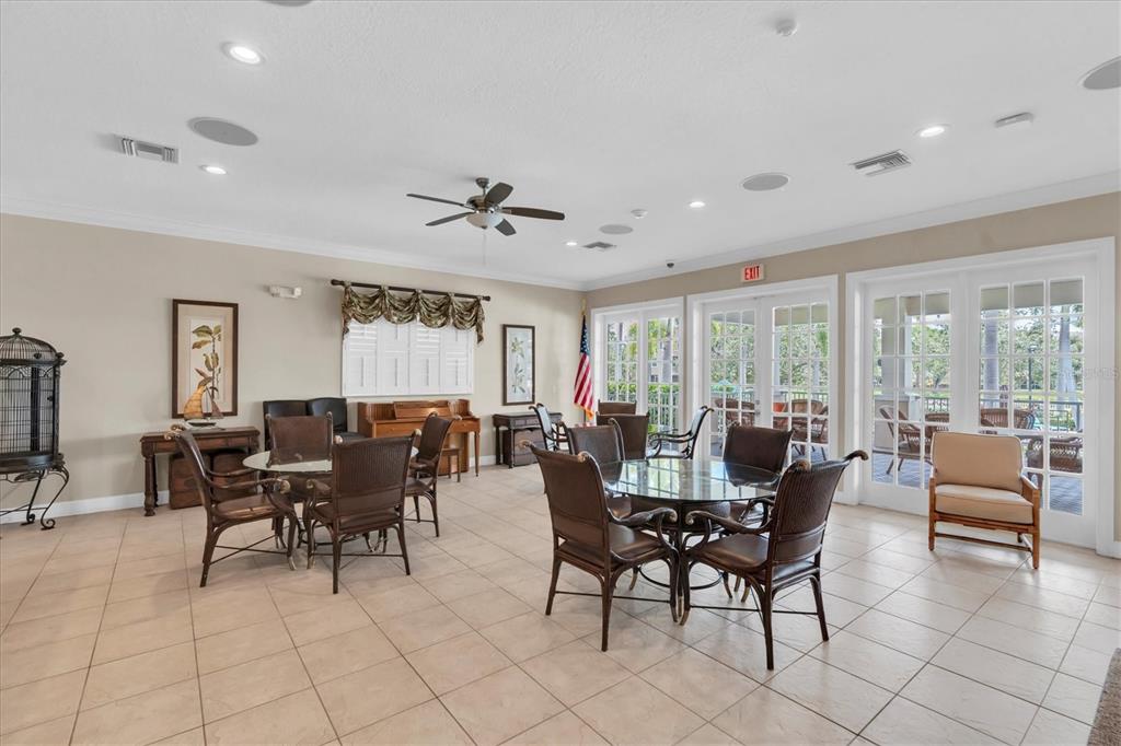 7069 Key Haven Road, Unit 302 Seminole, FL 33777 - Photo 48 of 65 a view of a dining room with furniture