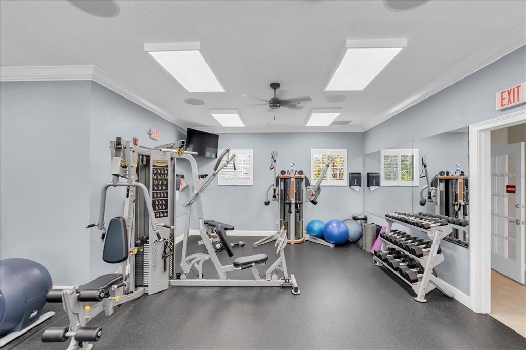 7069 Key Haven Road, Unit 302 Seminole, FL 33777 - Photo 52 of 65 a view of a room with gym equipment