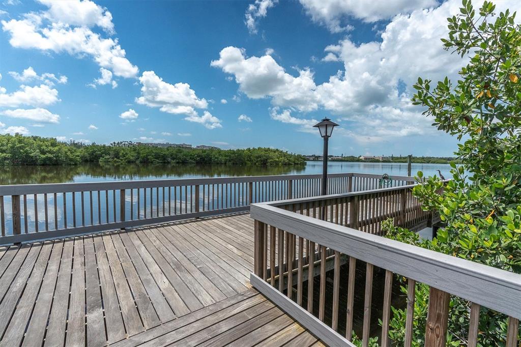 7069 Key Haven Road, Unit 302 Seminole, FL 33777 - Photo 56 of 65 a view of balcony with wooden floor