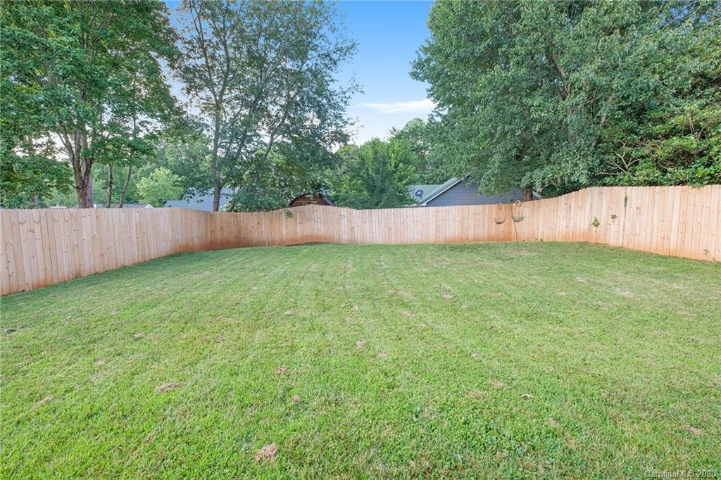 710 Foxborough Road Charlotte, NC 28213 - Photo 17 of 17 a view of a backyard with a small cabin