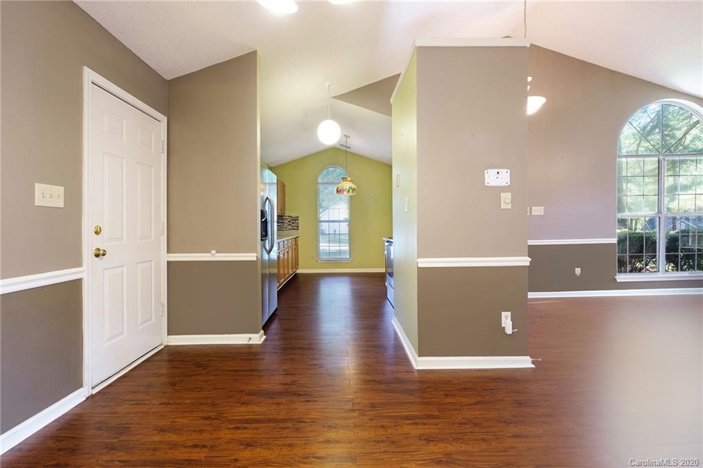 710 Foxborough Road Charlotte, NC 28213 - Photo 7 of 17 a view of a hallway with wooden floor