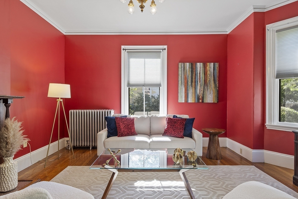 34 Day Street Somerville, MA 02144 - Photo 13 of 42 a living room with furniture and a window