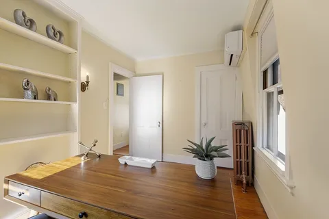 a kitchen with a sink and a window