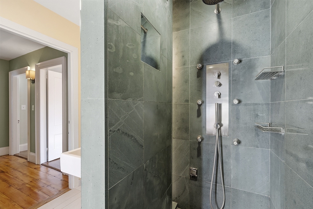 34 Day Street Somerville, MA 02144 - Photo 34 of 42 a bathroom with a shower