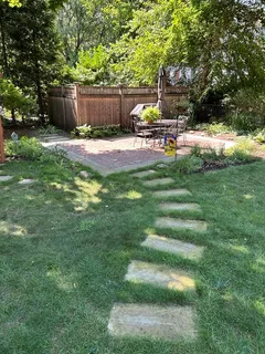 a view of a bench in a yard