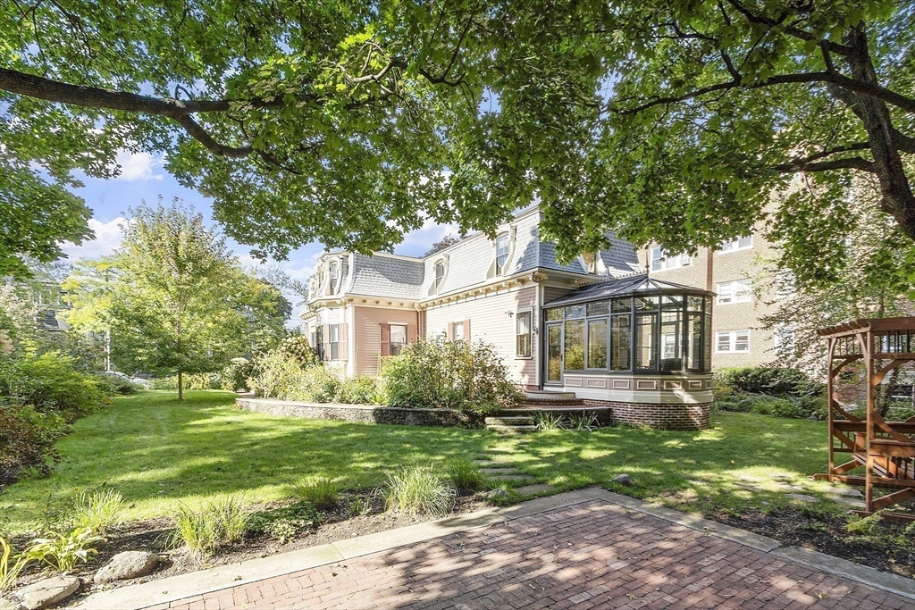 34 Day Street Somerville, MA 02144 - Photo 41 of 42 a front view of house with yard and green space