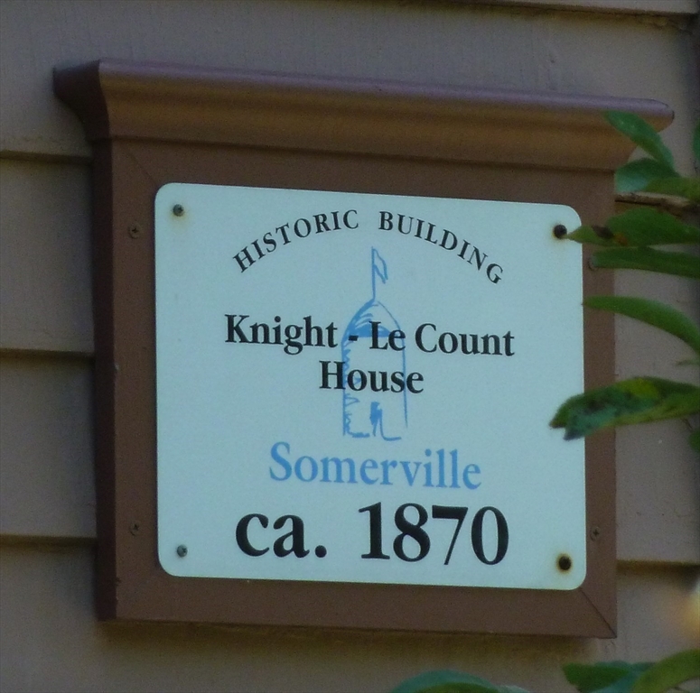 34 Day Street Somerville, MA 02144 - Photo 42 of 42 a close up of a sign