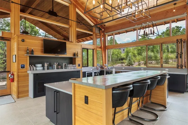 a view of a swimming pool and lounge chairs