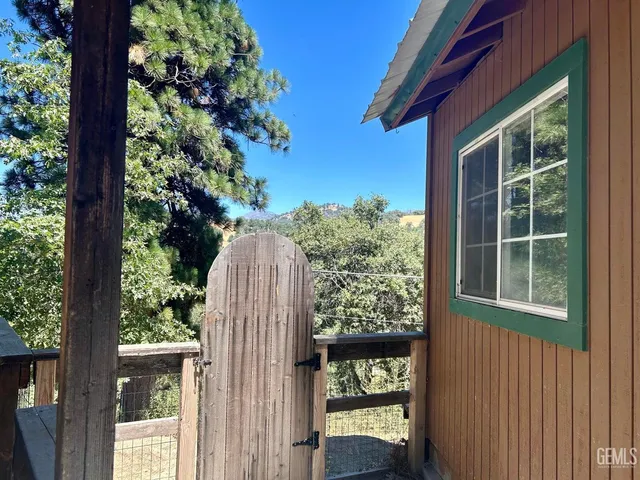 a view of a porch with a yard