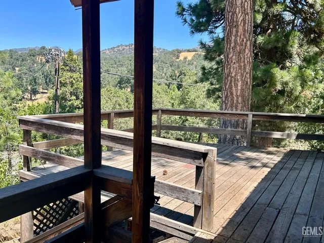 a view of a chairs and table in the patio