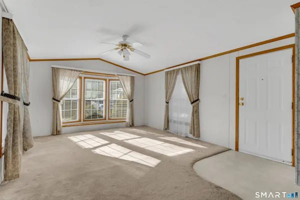 a view of a kitchen with a sink and a chandelier