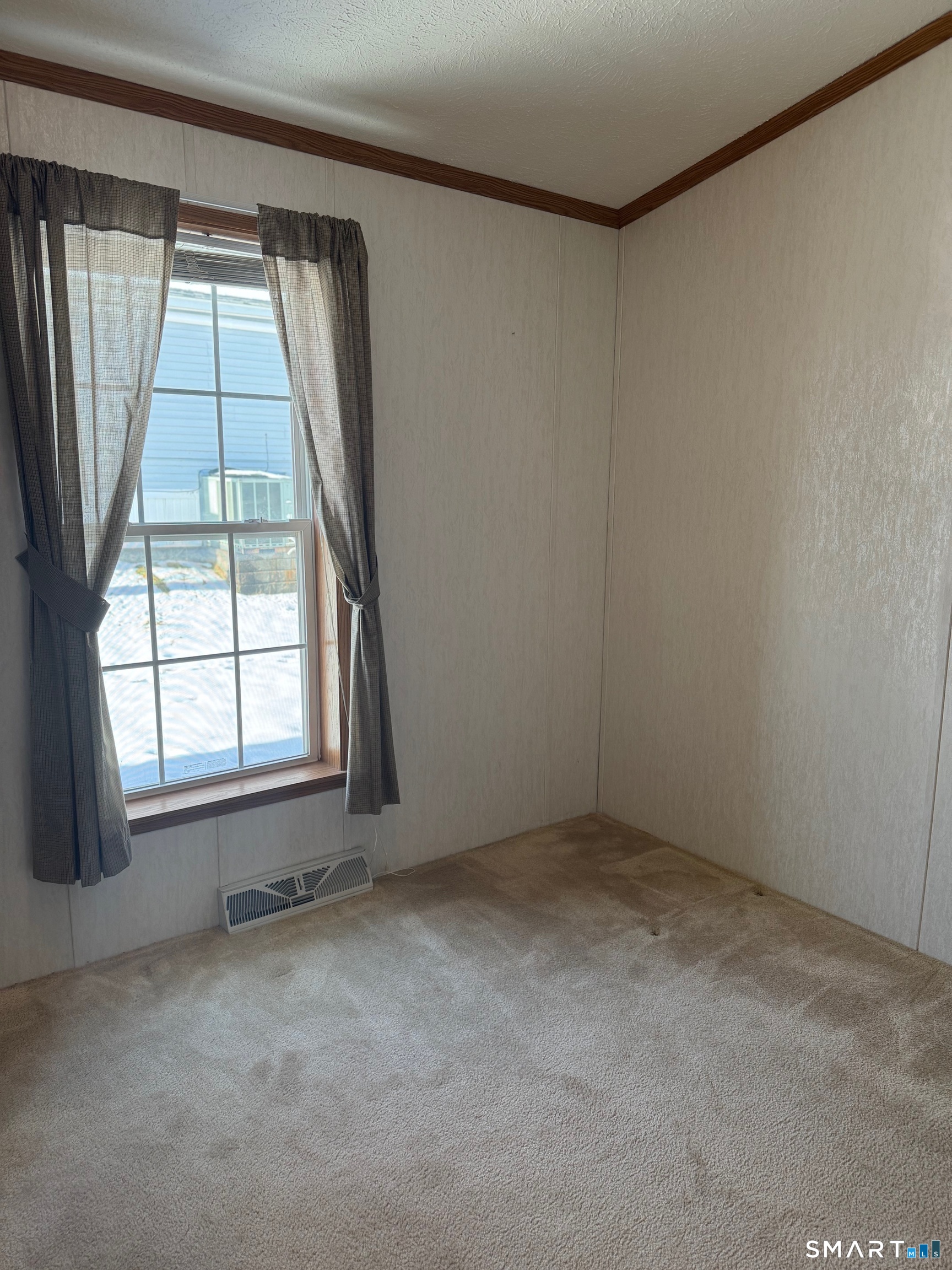 4 Maple Road Southington, CT 06489 - Photo 18 of 26 an empty room with a window