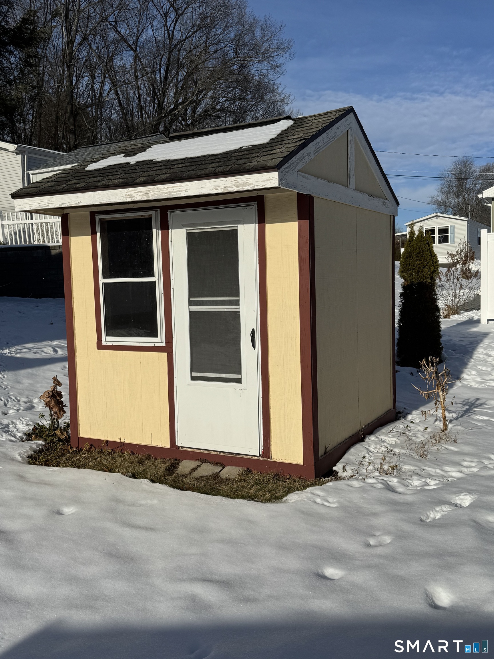 4 Maple Road Southington, CT 06489 - Photo 21 of 26 a front view of a house with a garage