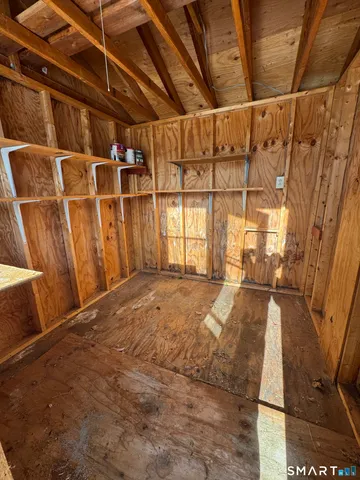 a view of entryway with kitchen
