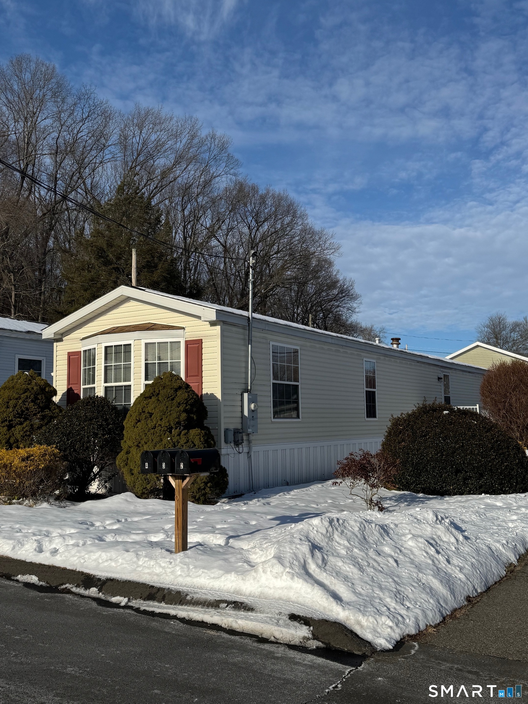 4 Maple Road Southington, CT 06489 - Photo 25 of 26 a front view of a house with a yard