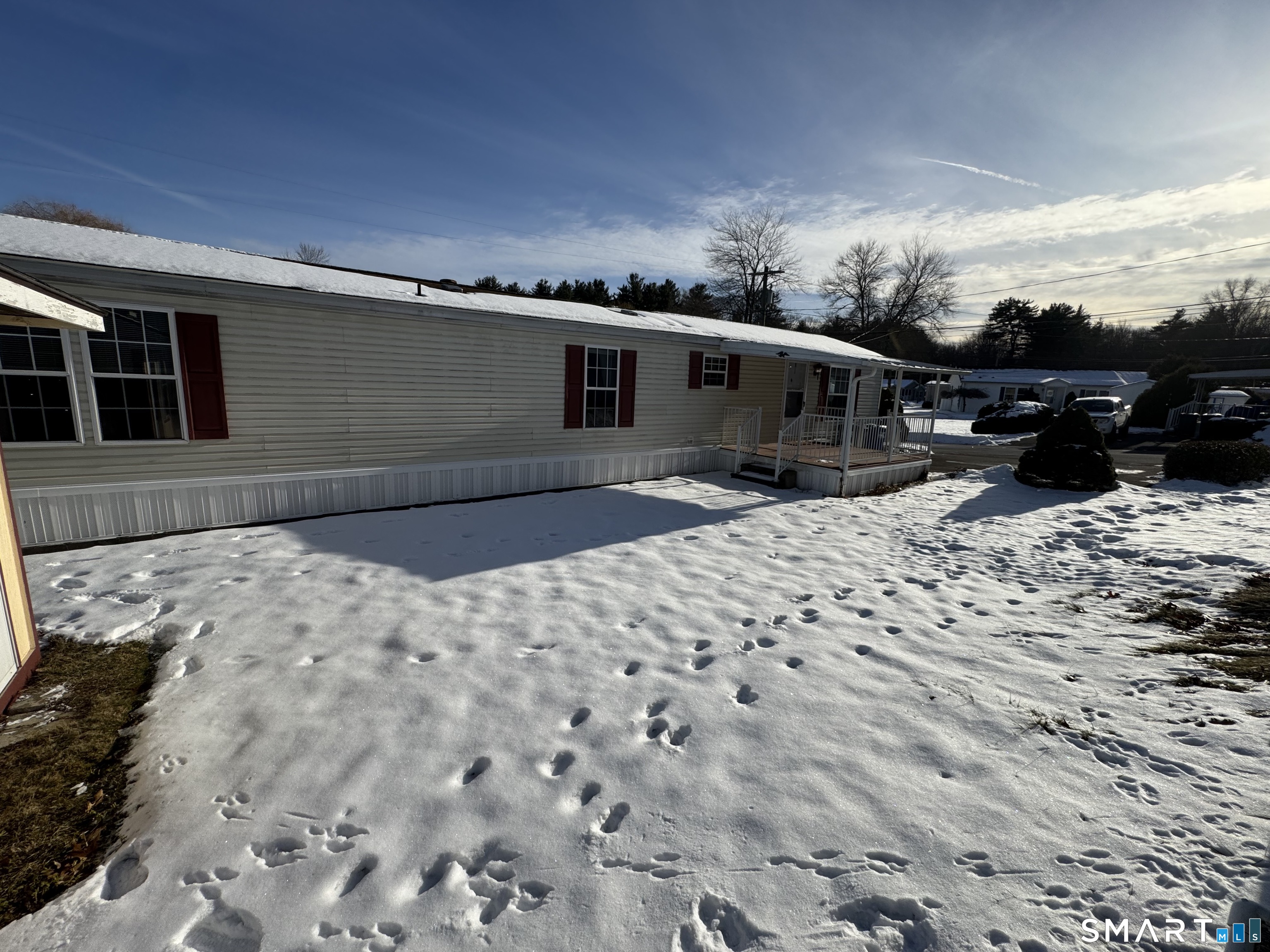 4 Maple Road Southington, CT 06489 - Photo 3 of 26 a front view of a house with a yard