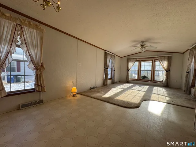 an empty room with windows