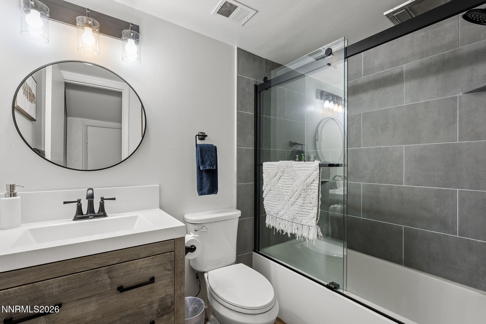 321 Ski Way Incline Village, NV 89451 - Photo 15 of 17 a bathroom with a sink a toilet and a mirror