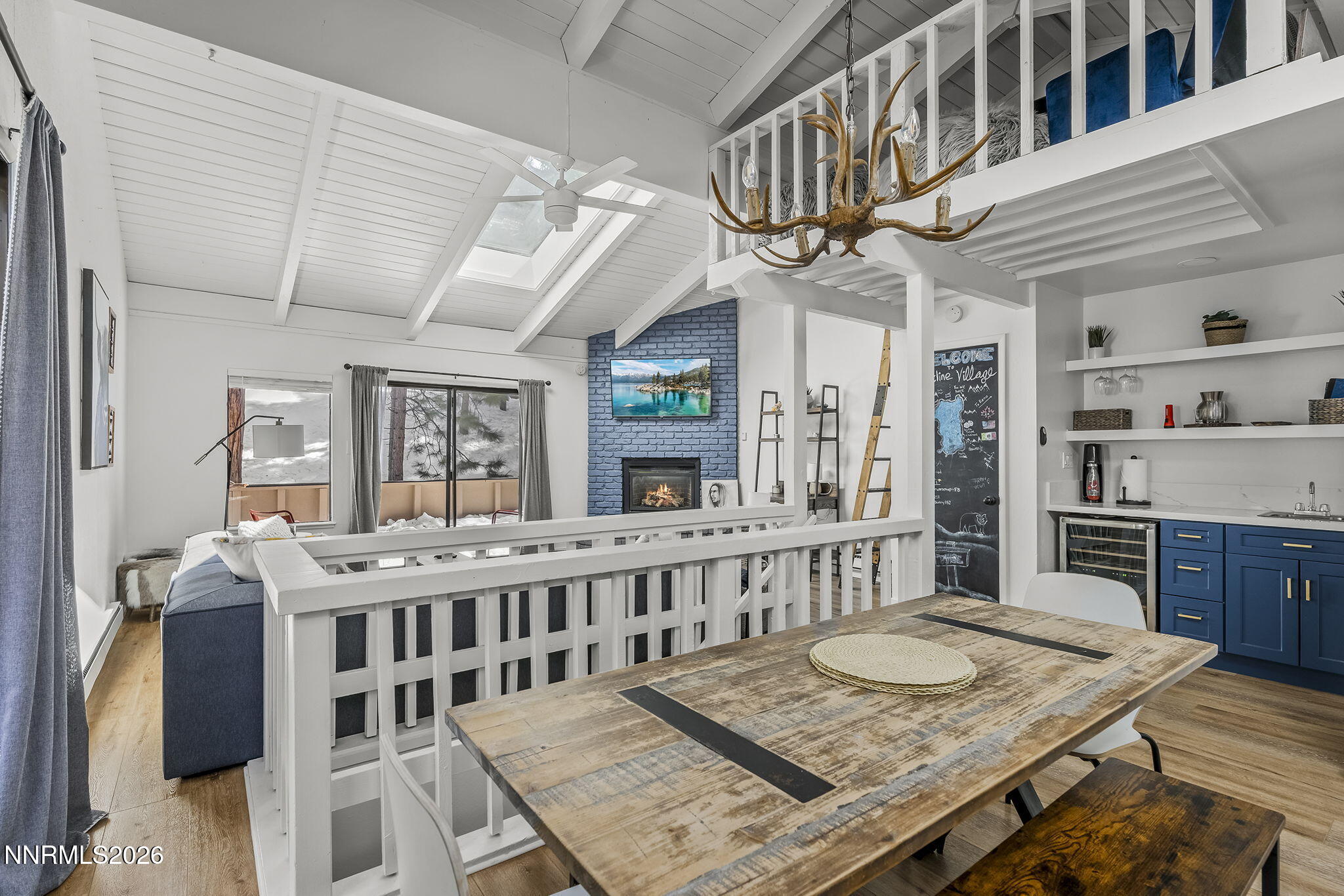321 Ski Way Incline Village, NV 89451 - Photo 7 of 17 a view of a dining room with furniture window and wooden floor