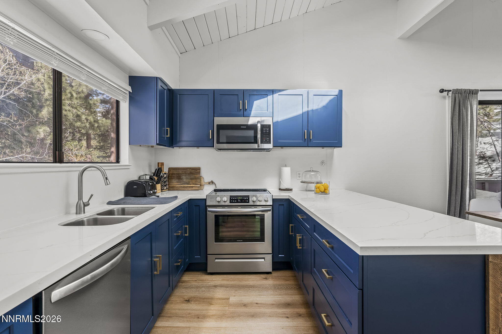 321 Ski Way Incline Village, NV 89451 - Photo 9 of 17 a kitchen with a sink and a stove top oven