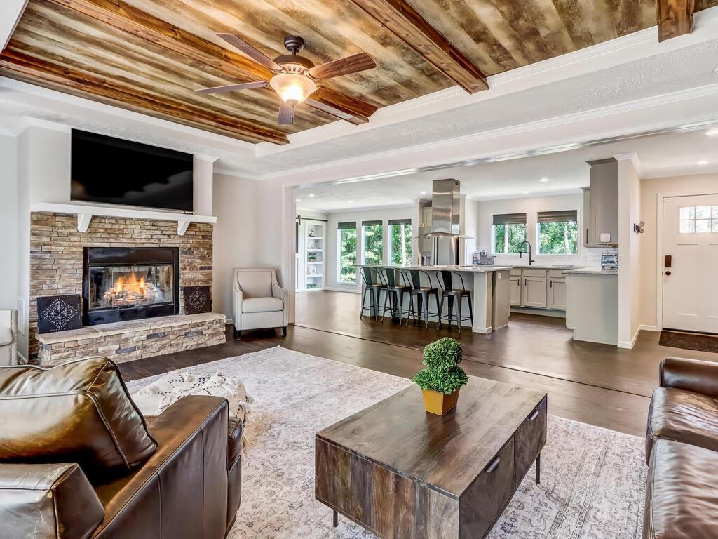 You instantly feel at home within this family room, given the abundance of character and open concept where you'll never miss a moment as you mingle from room to room!