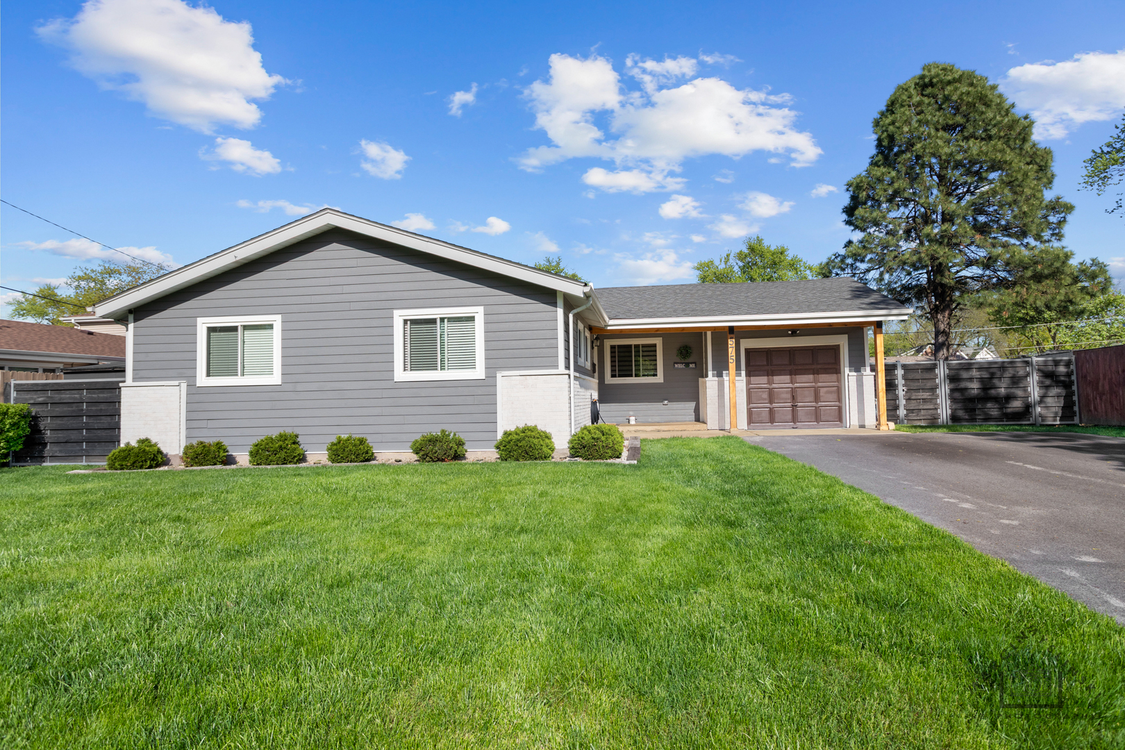 575 Olive Street Hoffman Estates, IL 60169 - Photo 1 of 26 a view of a house with a backyard