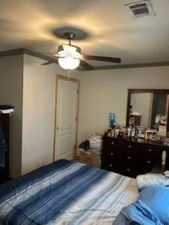 a bathroom with a toilet a sink and shower