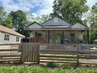 a front view of a house with a porch