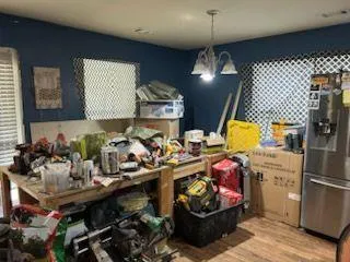 a kitchen with stainless steel appliances a stove a sink and a refrigerator