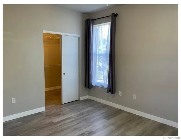 a kitchen with a stove and a microwave