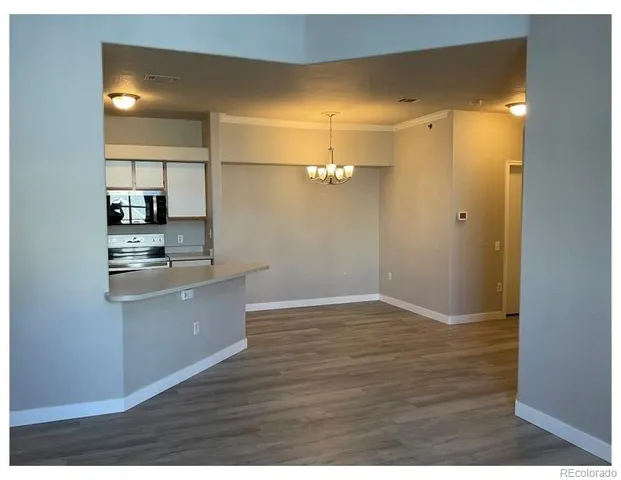 a black and white photo of a living room
