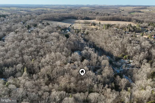an aerial view of house with outdoor space