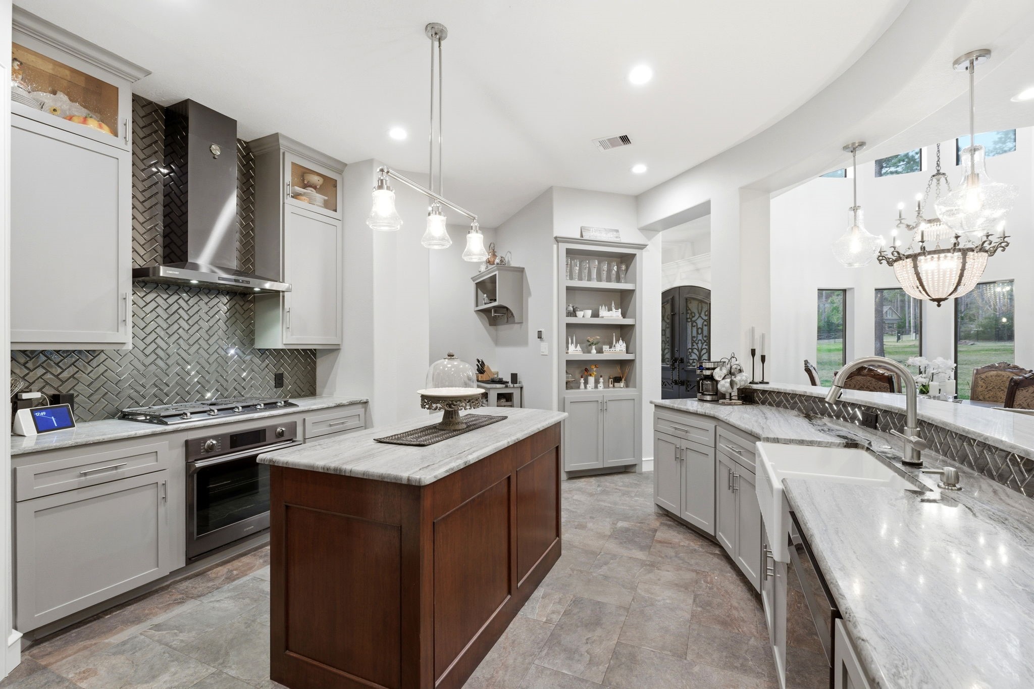 280 Sundog Road Huntsville, TX 77340 - Photo 16 of 50 a kitchen with stainless steel appliances granite countertop a sink stove and refrigerator