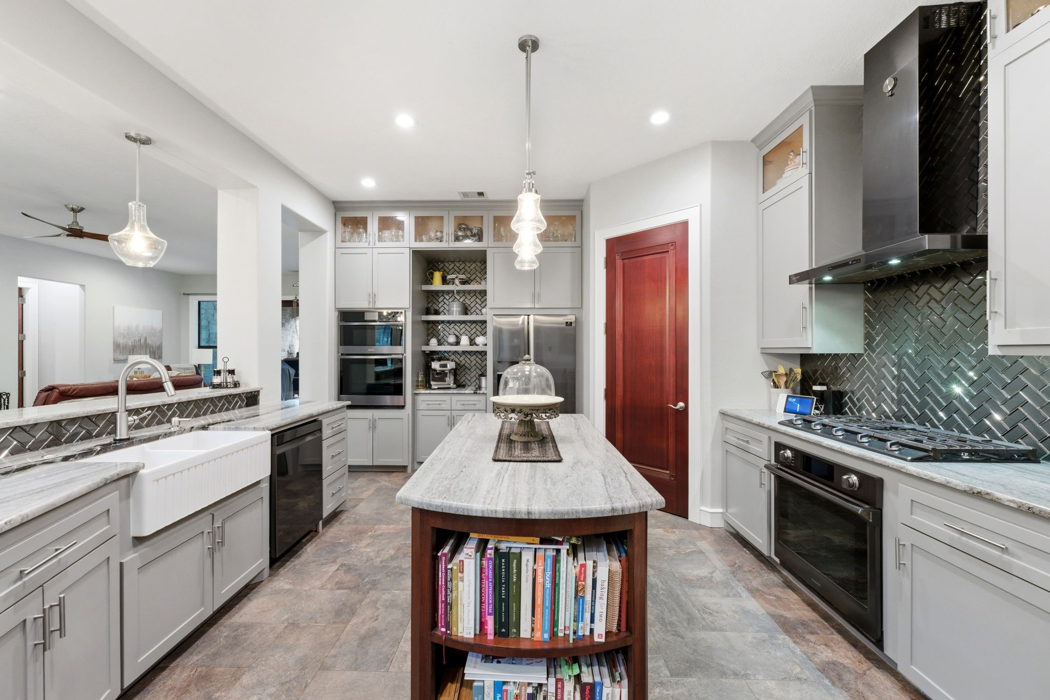 280 Sundog Road Huntsville, TX 77340 - Photo 17 of 50 a kitchen with stainless steel appliances a sink stove and refrigerator