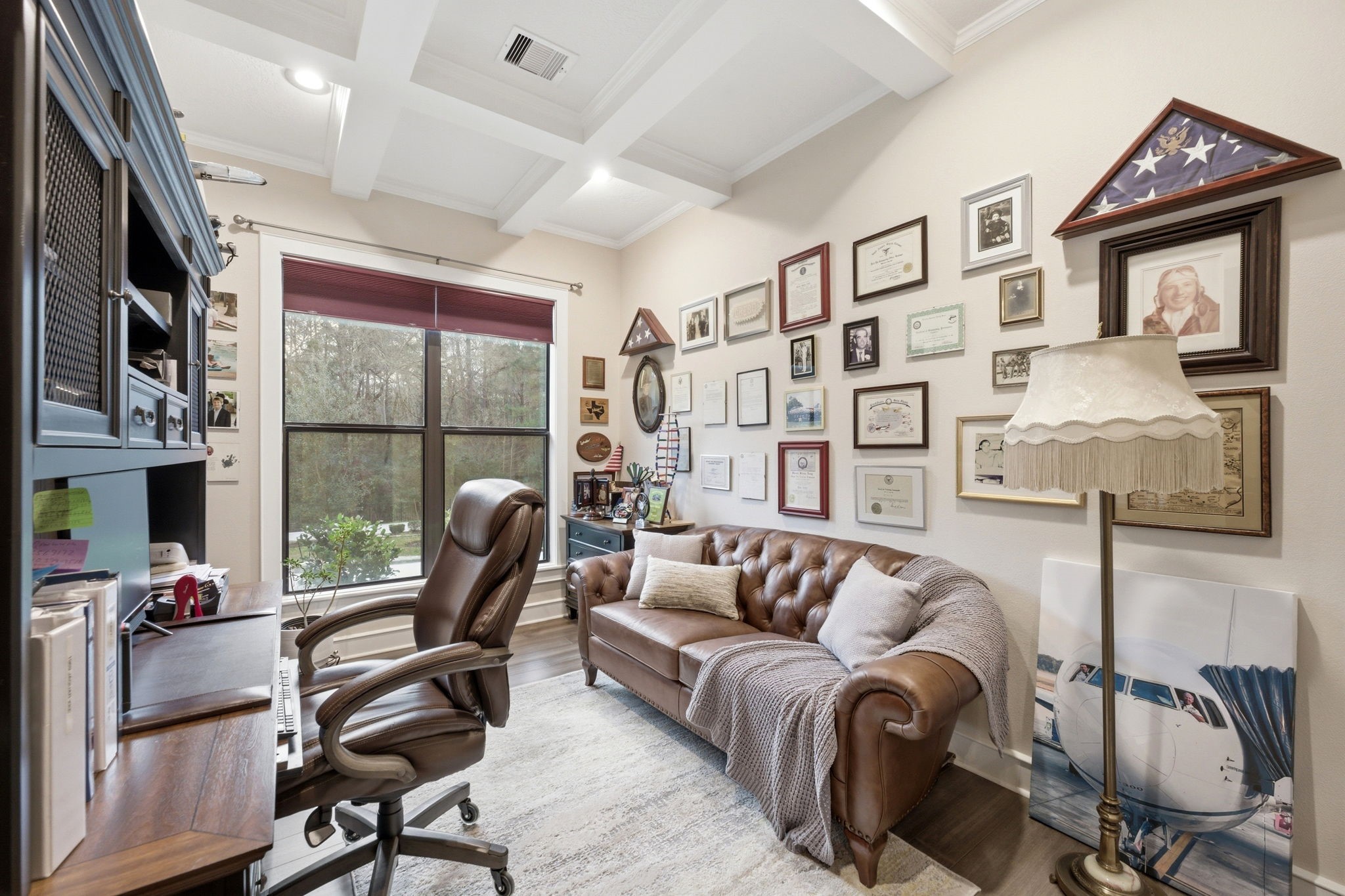 280 Sundog Road Huntsville, TX 77340 - Photo 20 of 50 a living room with furniture fireplace and a large window