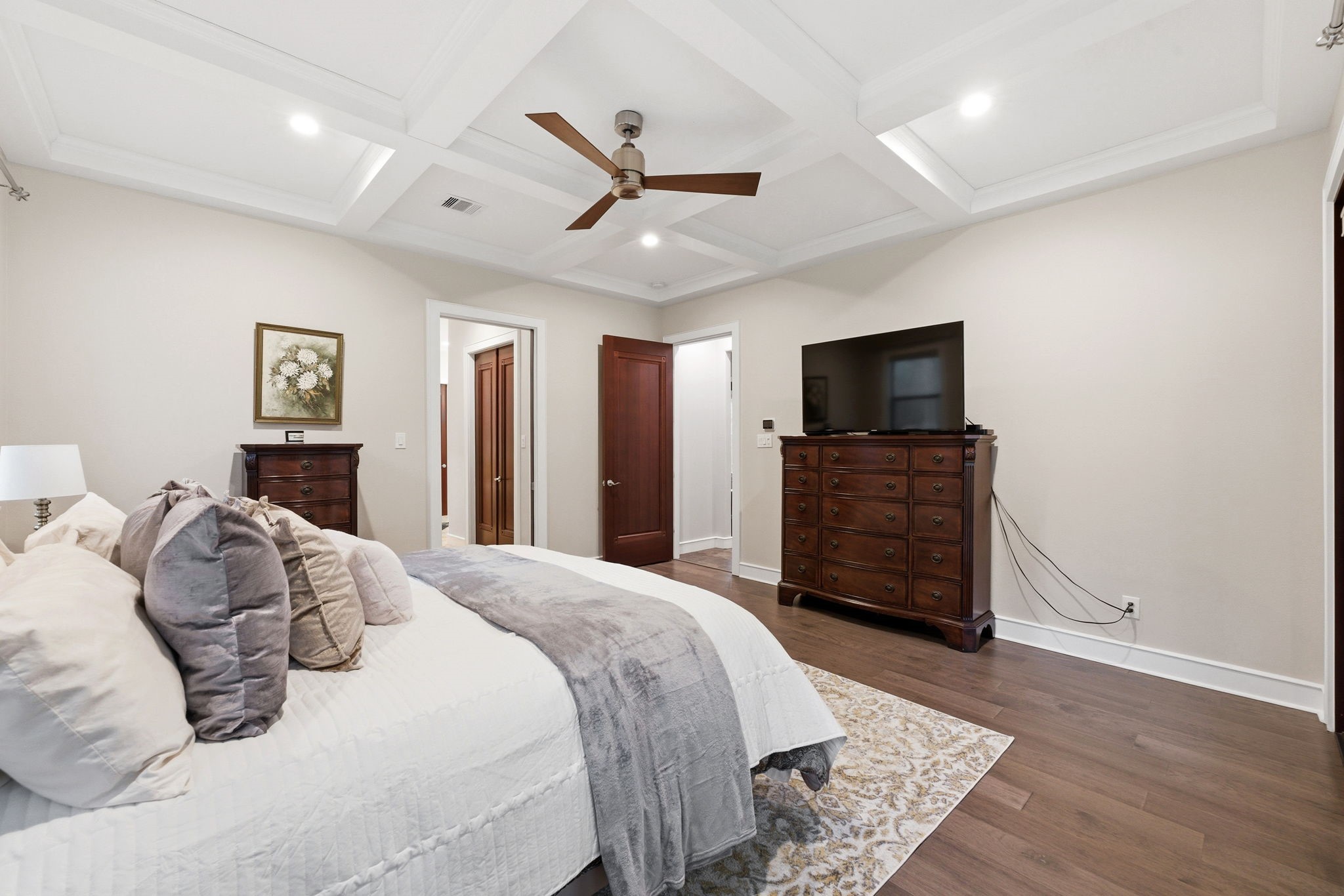 280 Sundog Road Huntsville, TX 77340 - Photo 23 of 50 a bedroom with a bed and a television