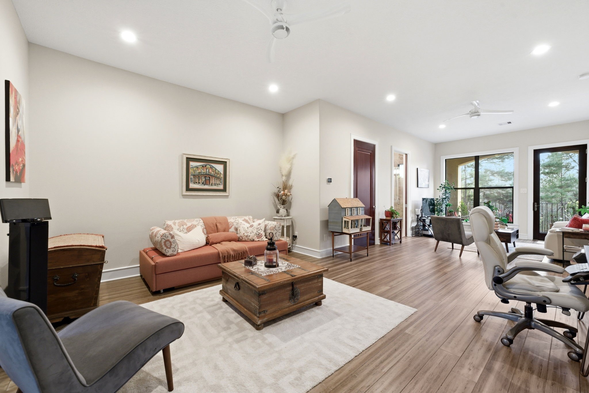 280 Sundog Road Huntsville, TX 77340 - Photo 31 of 50 a living room with furniture rug and wooden floor